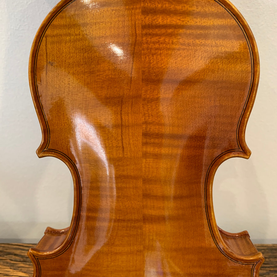 Eighth size violin with bow and case